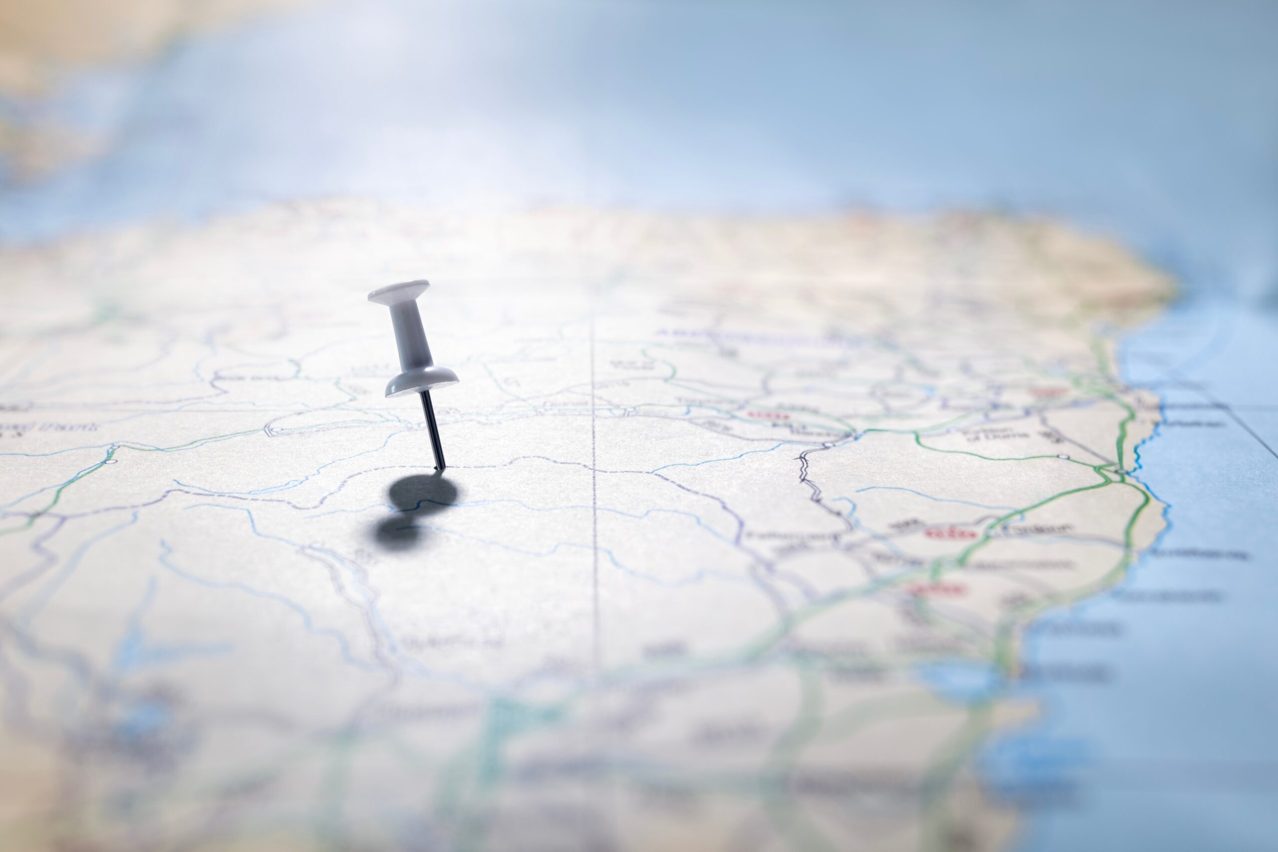 White pushpin marking the location of a destination