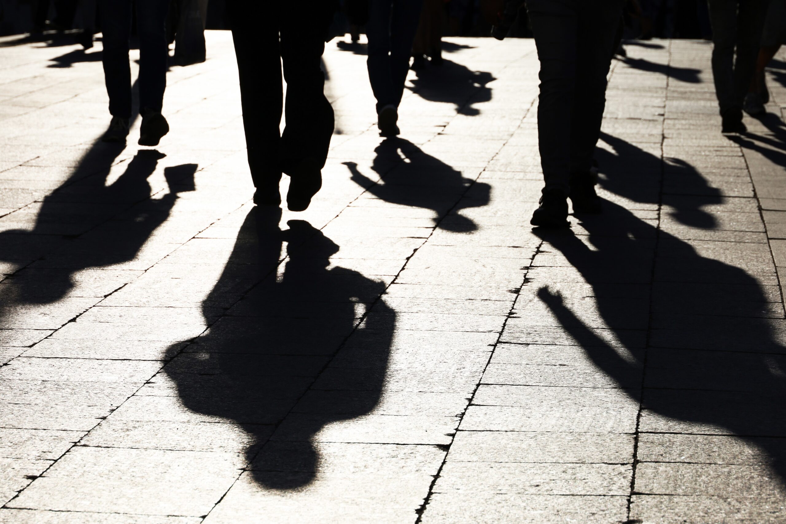 Black silhouettes and shadows of people