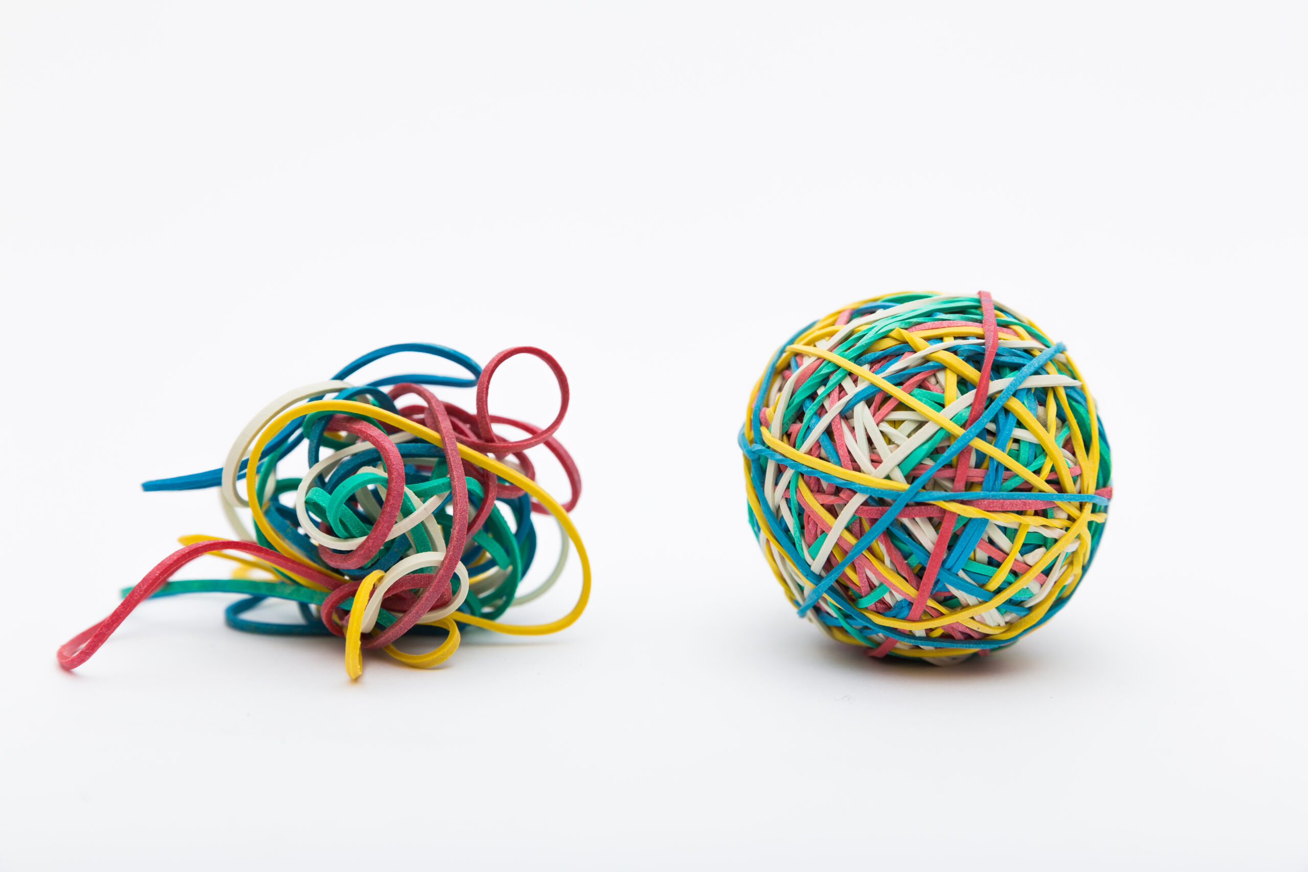 Coloured-Rubber-Band-Ball-Next-to-Messy-Ball