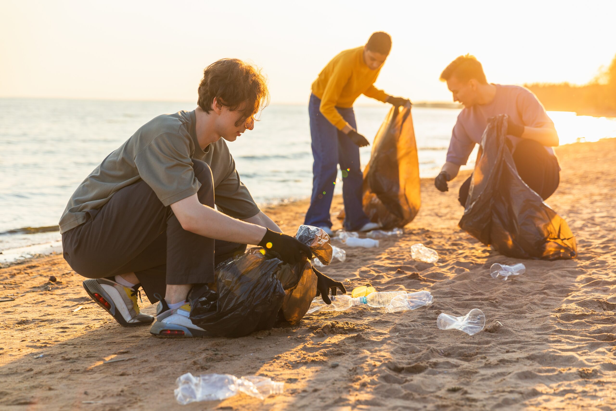 Volunteers activists team collects garbage